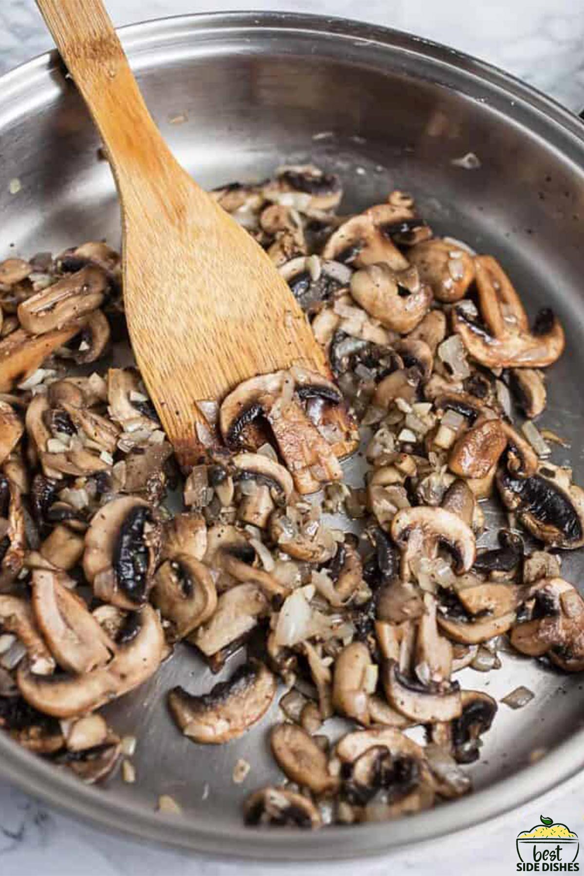 Sauteing mushrooms in a skillet