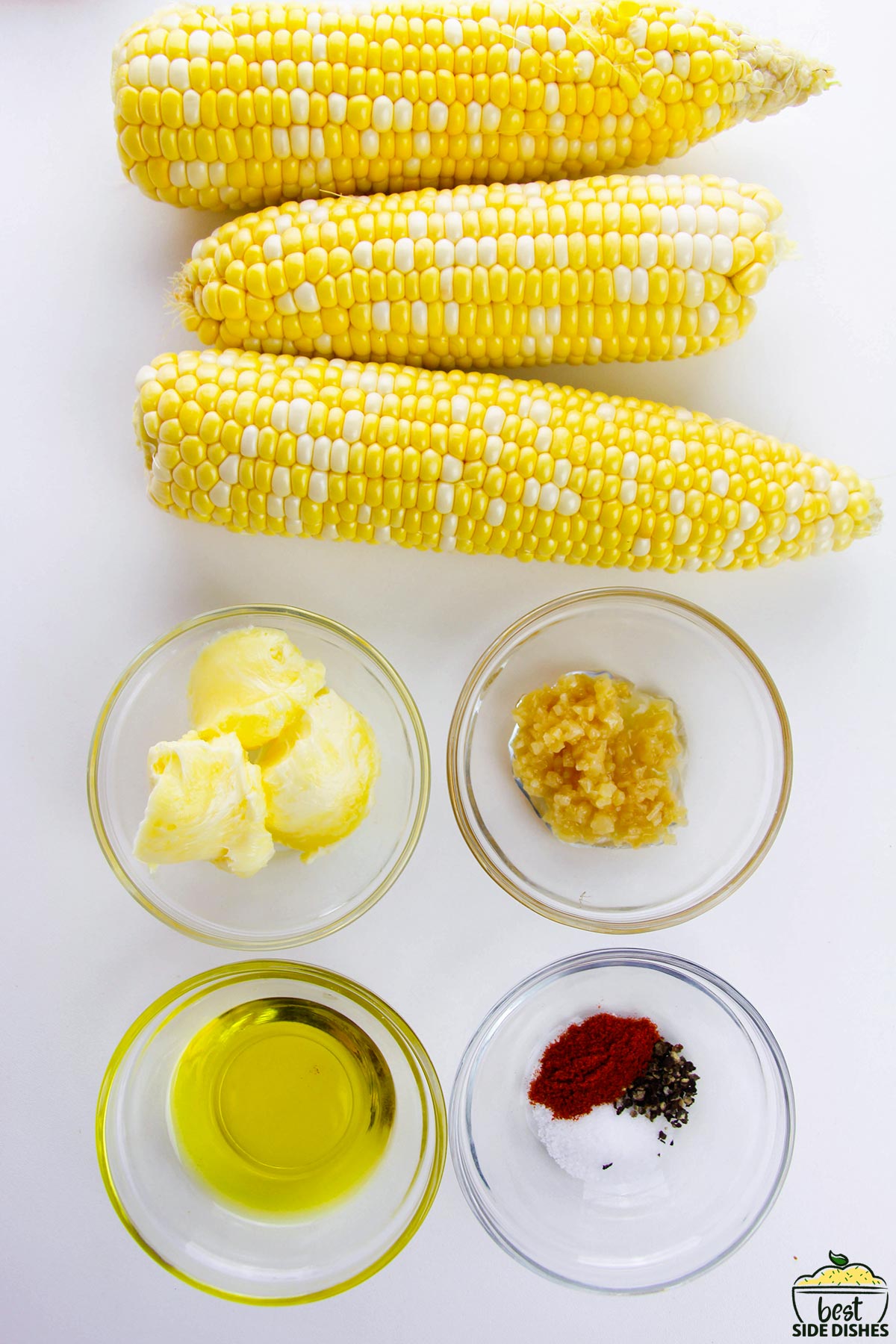 Corn ribs ingredients on a white surface