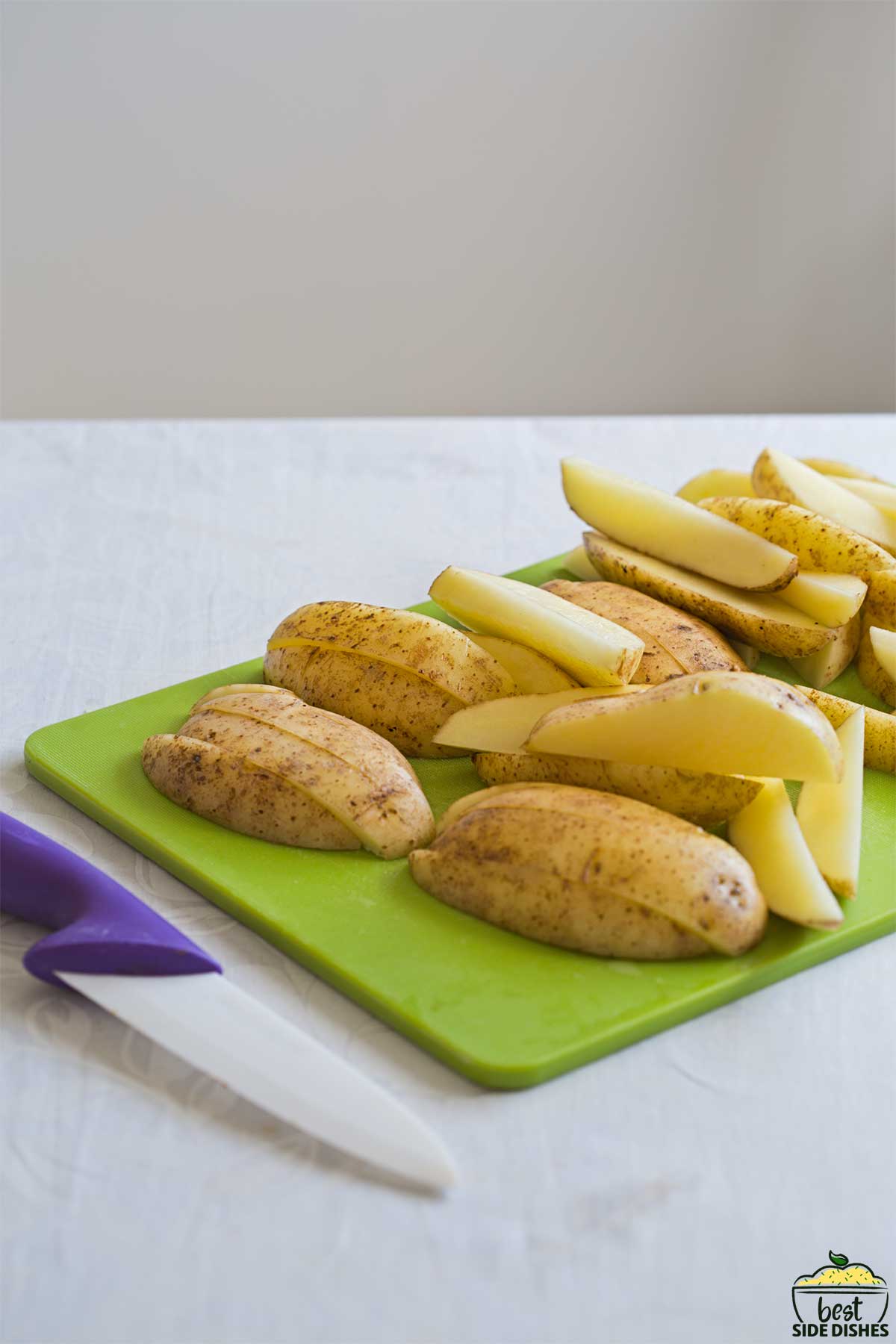 potato wedges on cutting board