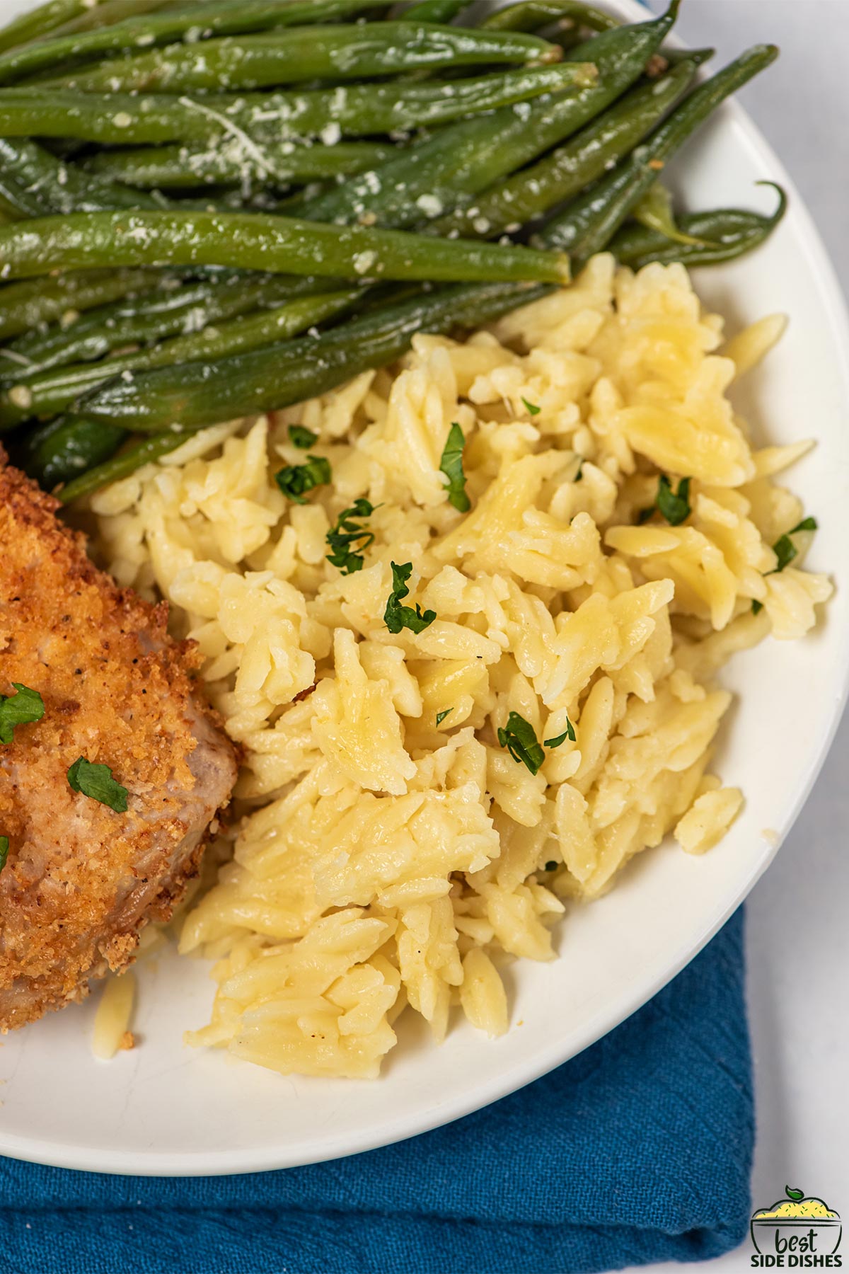 orzo with fried pork chop and green beans