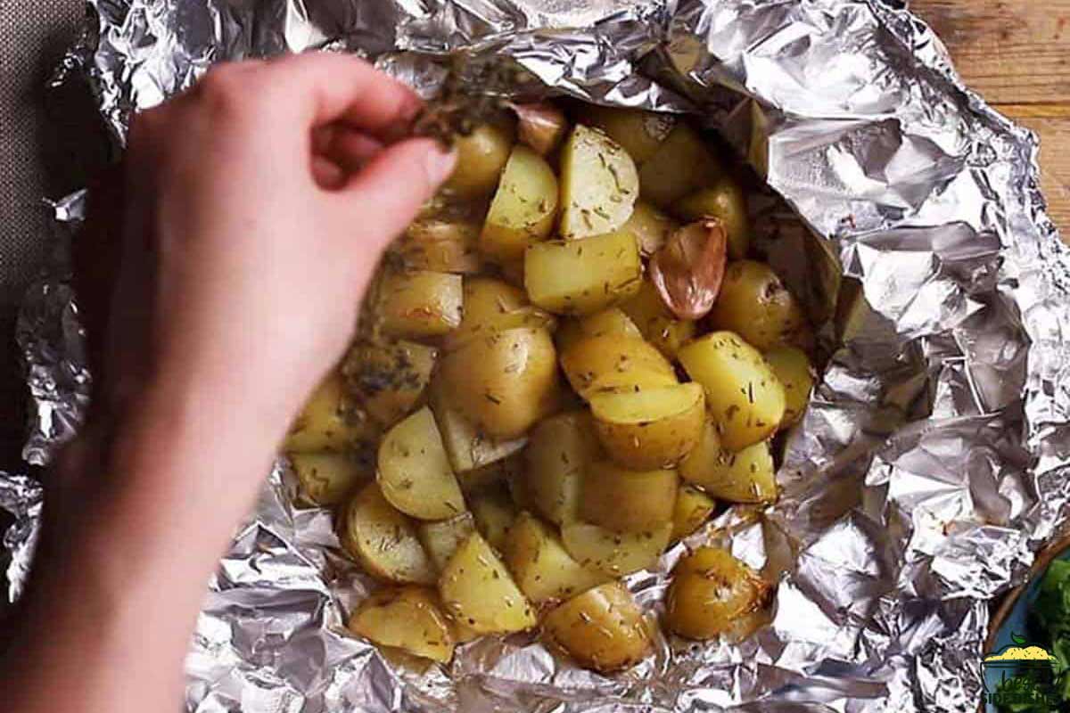 Potatoes in foil ready to add back to the grill