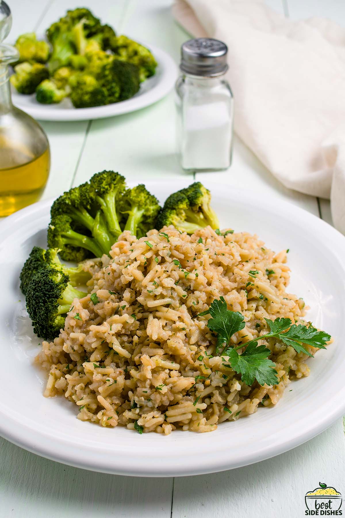rice a roni on a plate with broccoli